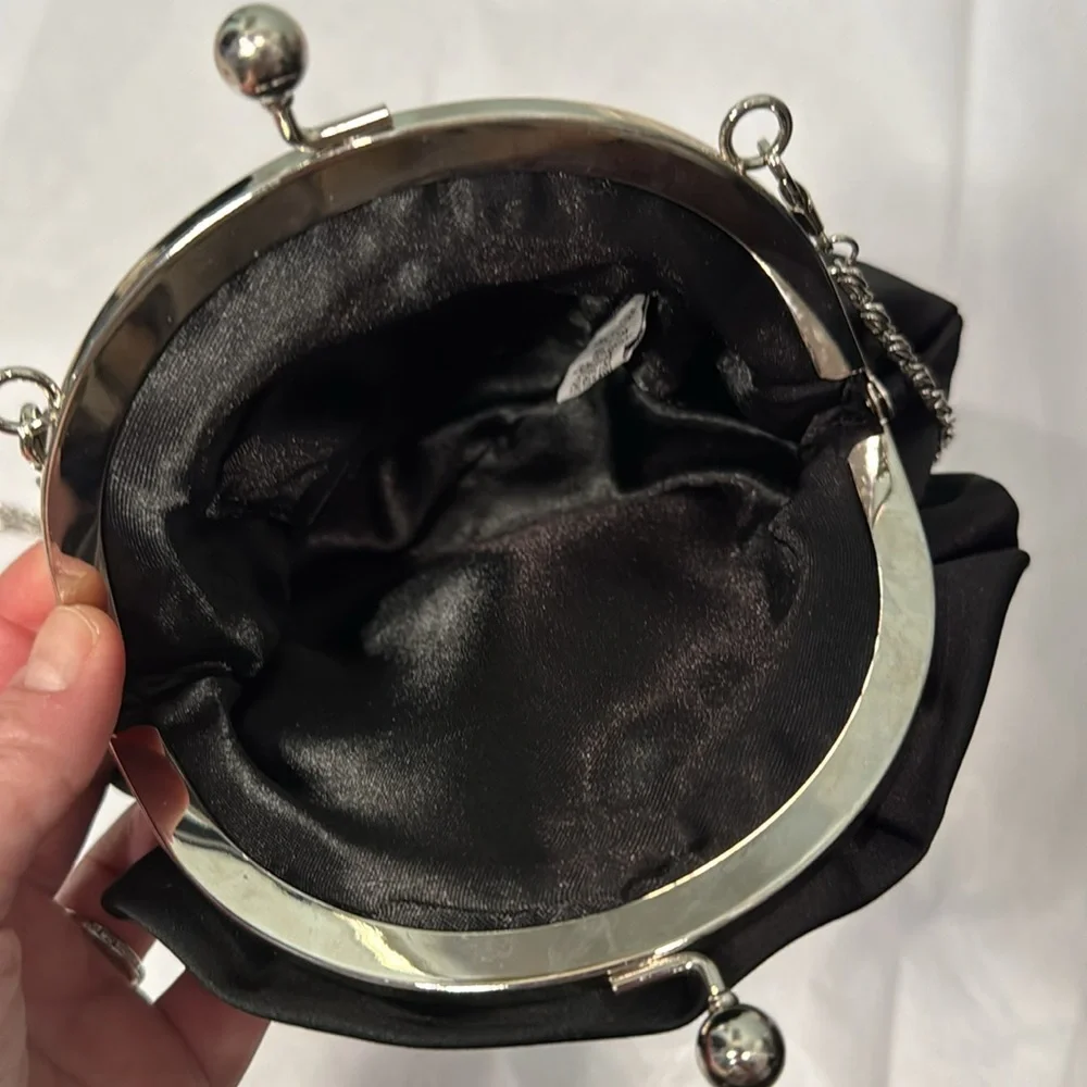 Black satin rosette purse with removable silver chain